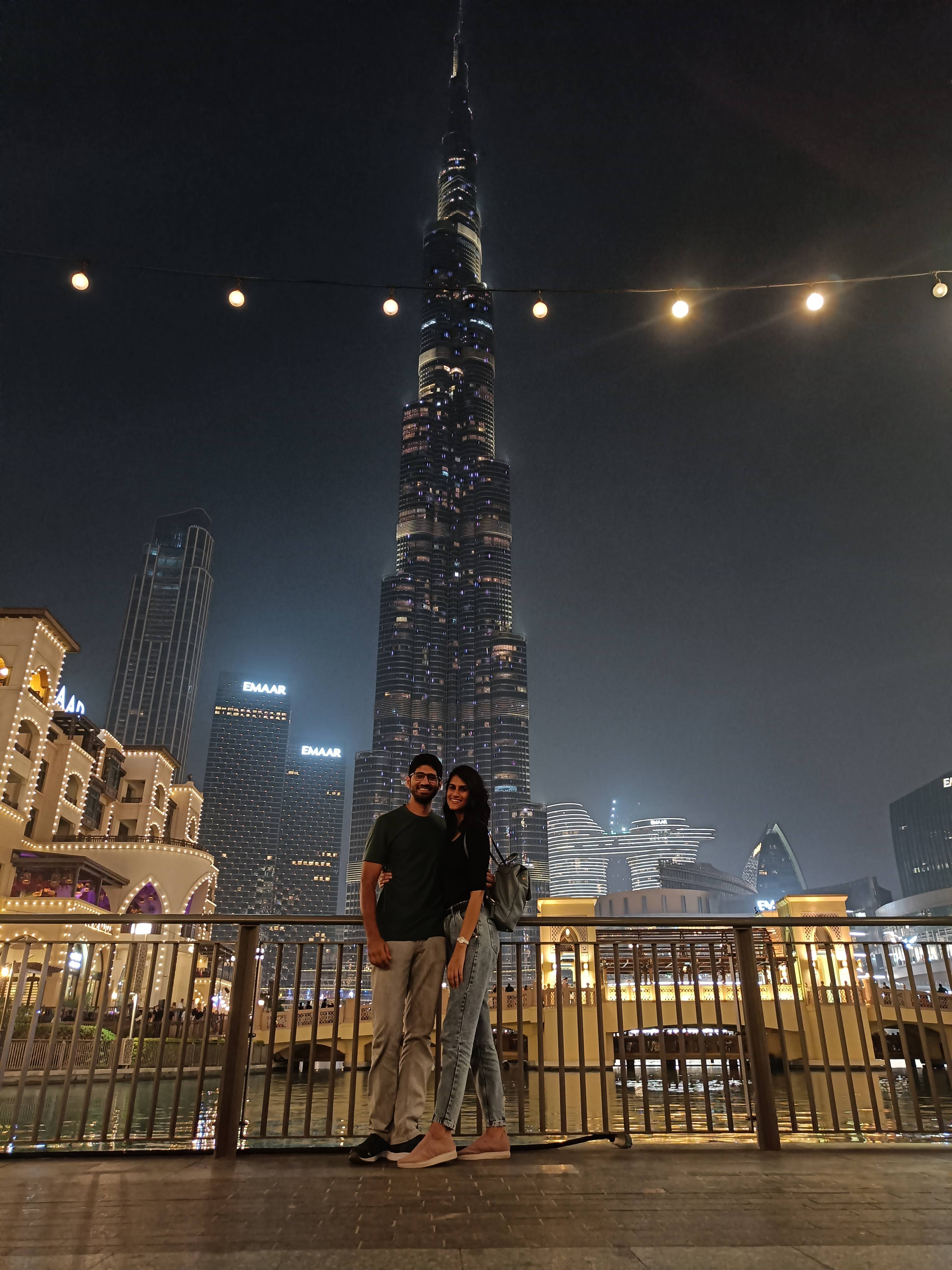 Burj Khalifa at night with illuminated facade - spectacular evening view of Dubai's iconic skyscraper